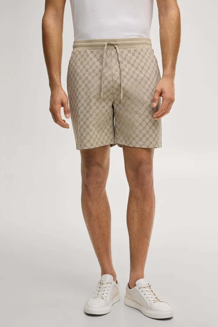 Leads to product detail page "Cornflower Sweat Shorts in Beige"