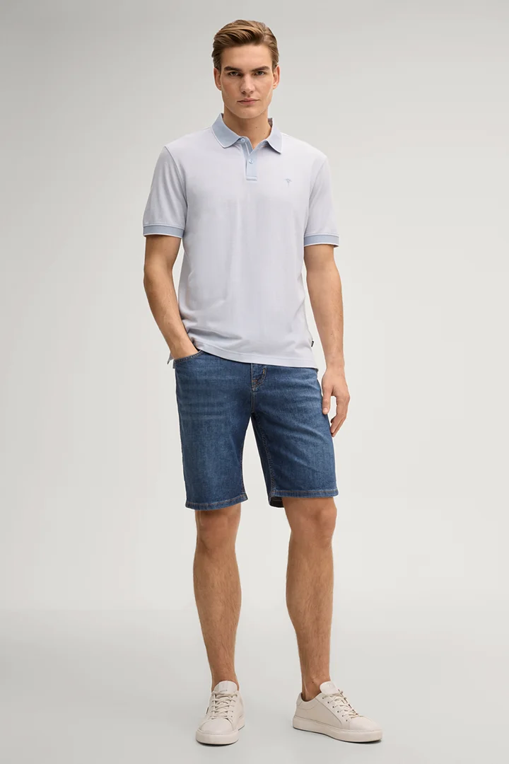 Leads to product detail page "Percyco polo shirt in light blue"