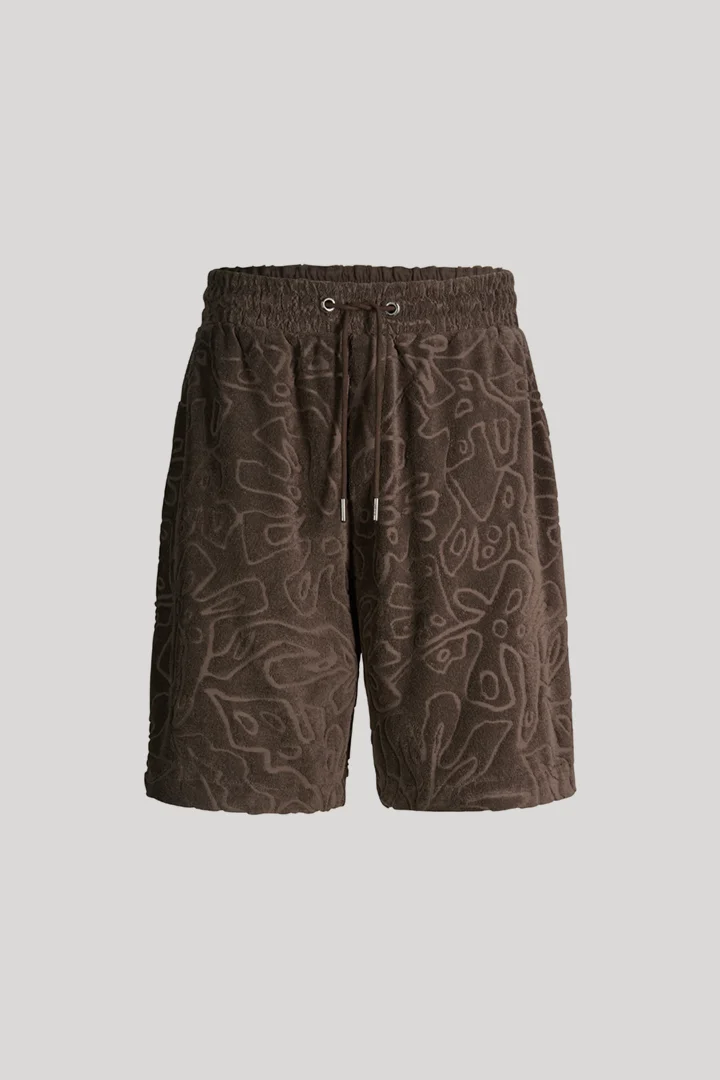Leads to product detail page "Wailoa patterned sweat shorts in dark brown"