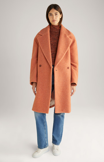 Sweter dzianinowy z wełny ze strzyży w kolorze pomarańczowym, z efektem melanżu