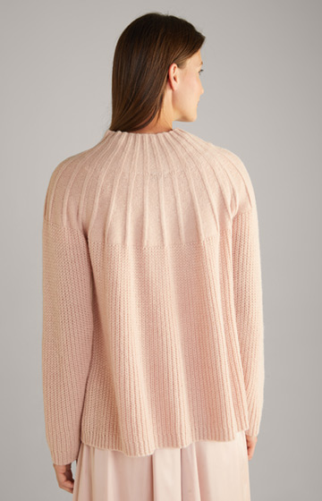 Dzianinowy sweter w kolorze różowym