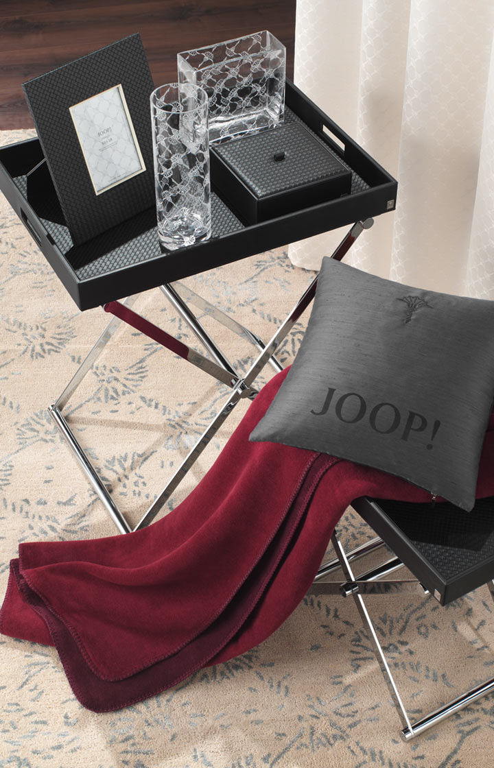 JOOP! presents the look with the products All-over crystal vase (30x10), white and Crystal vase all-over print (20x8x20), white