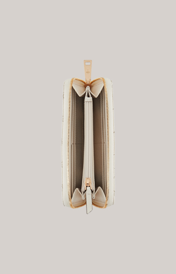 Leads to product detail page "Cortina Melte Wallet in Off-white"