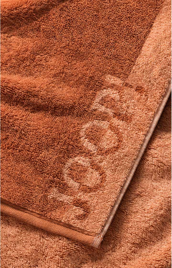 JOOP! TONE DOUBLEFACE hand towel in copper