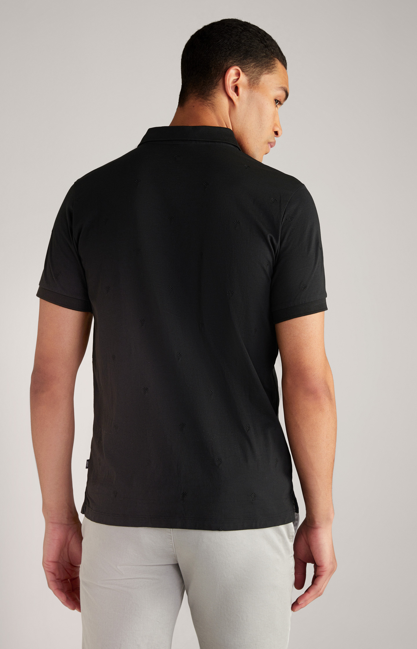 Black polo outlet shirt back