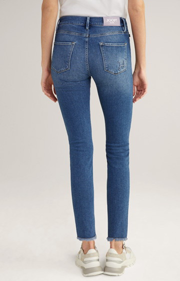 Elastyczne jeansy w kolorze Denim Blue z efektem sprania