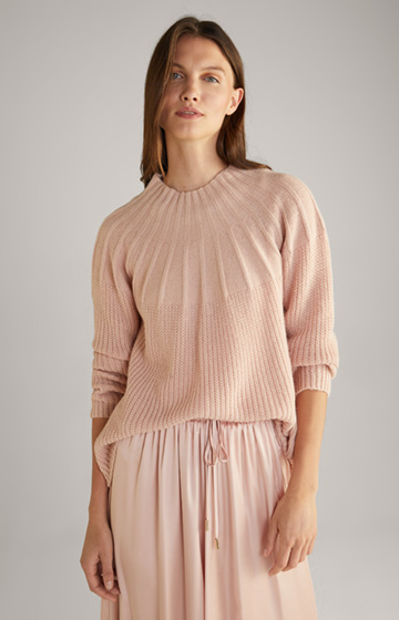 Dzianinowy sweter w kolorze różowym